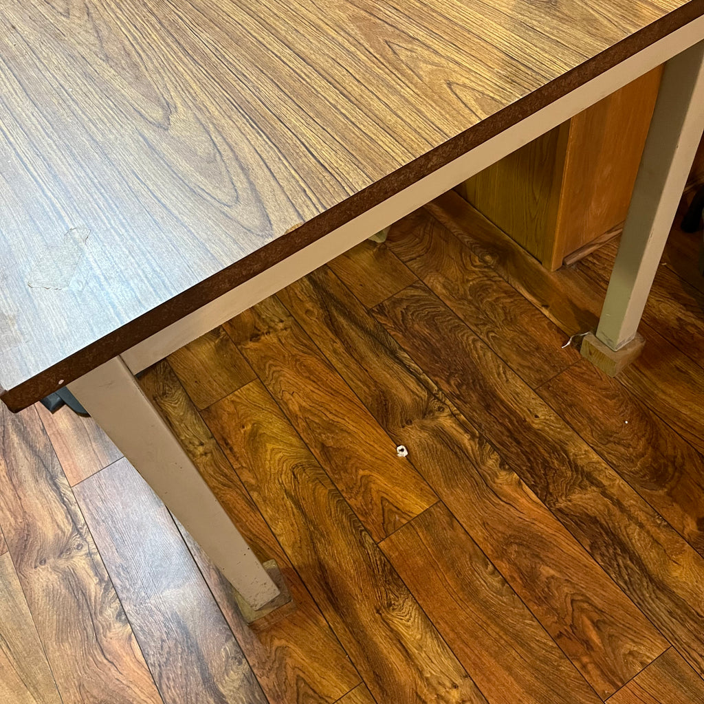 F615 Vintage metal table with wooden veneer top (6ft x 3ft x 29" high, veneer is peeling)