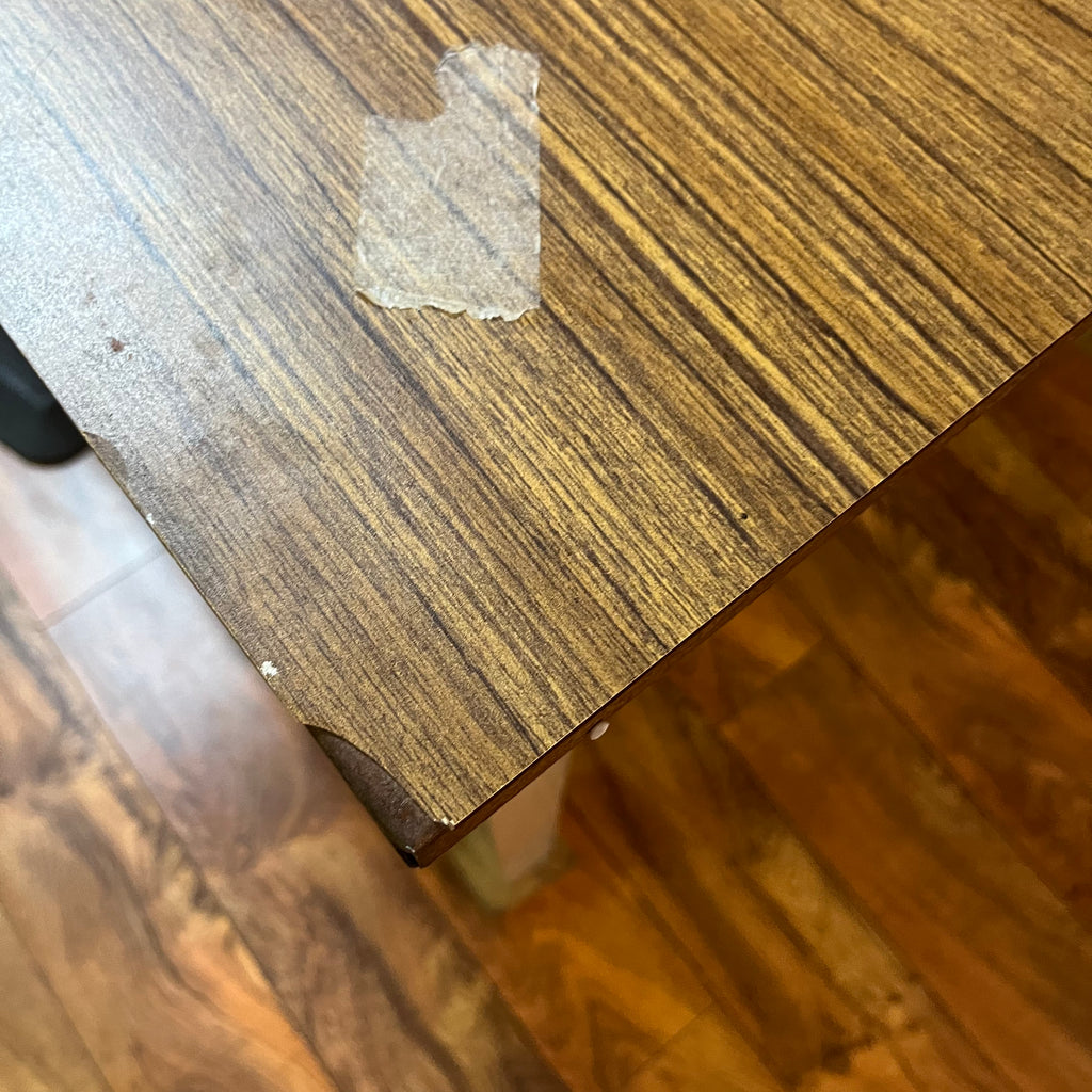 F615 Vintage metal table with wooden veneer top (6ft x 3ft x 29" high, veneer is peeling)