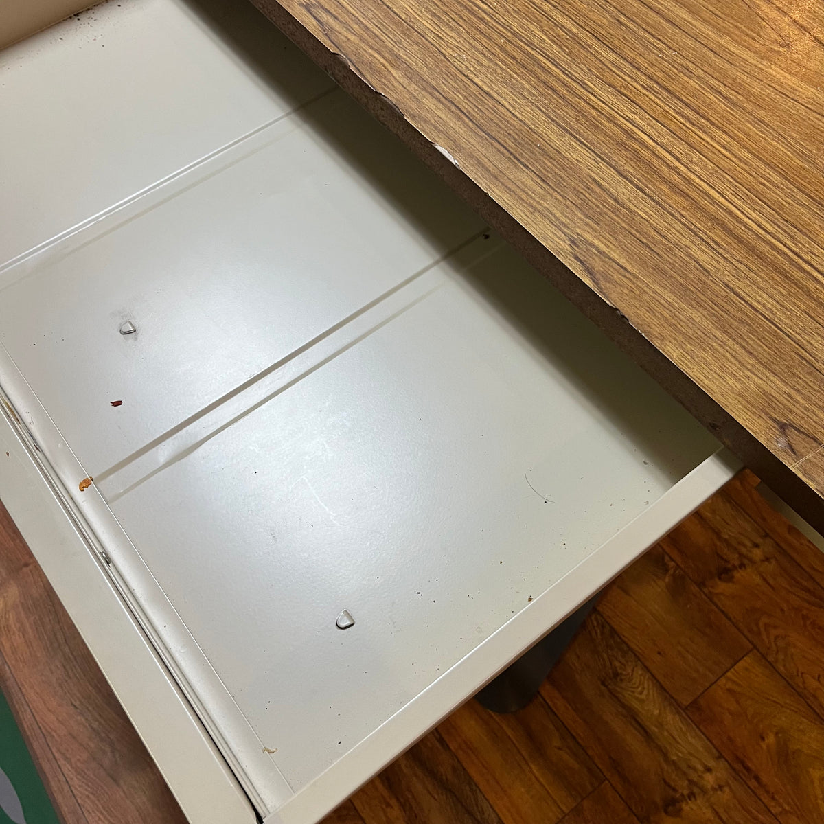 F615 Vintage metal table with wooden veneer top (6ft x 3ft x 29" high, veneer is peeling)