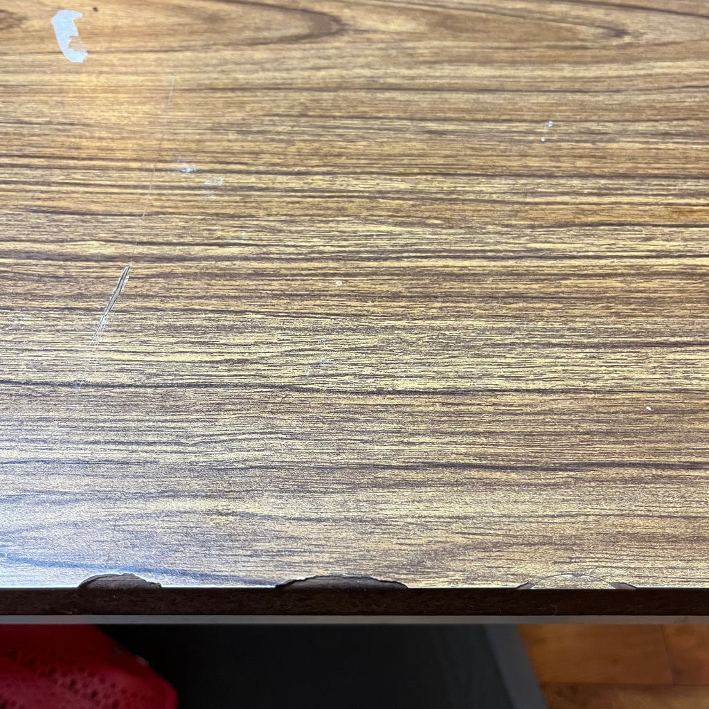 F615 Vintage metal table with wooden veneer top (6ft x 3ft x 29" high, veneer is peeling)