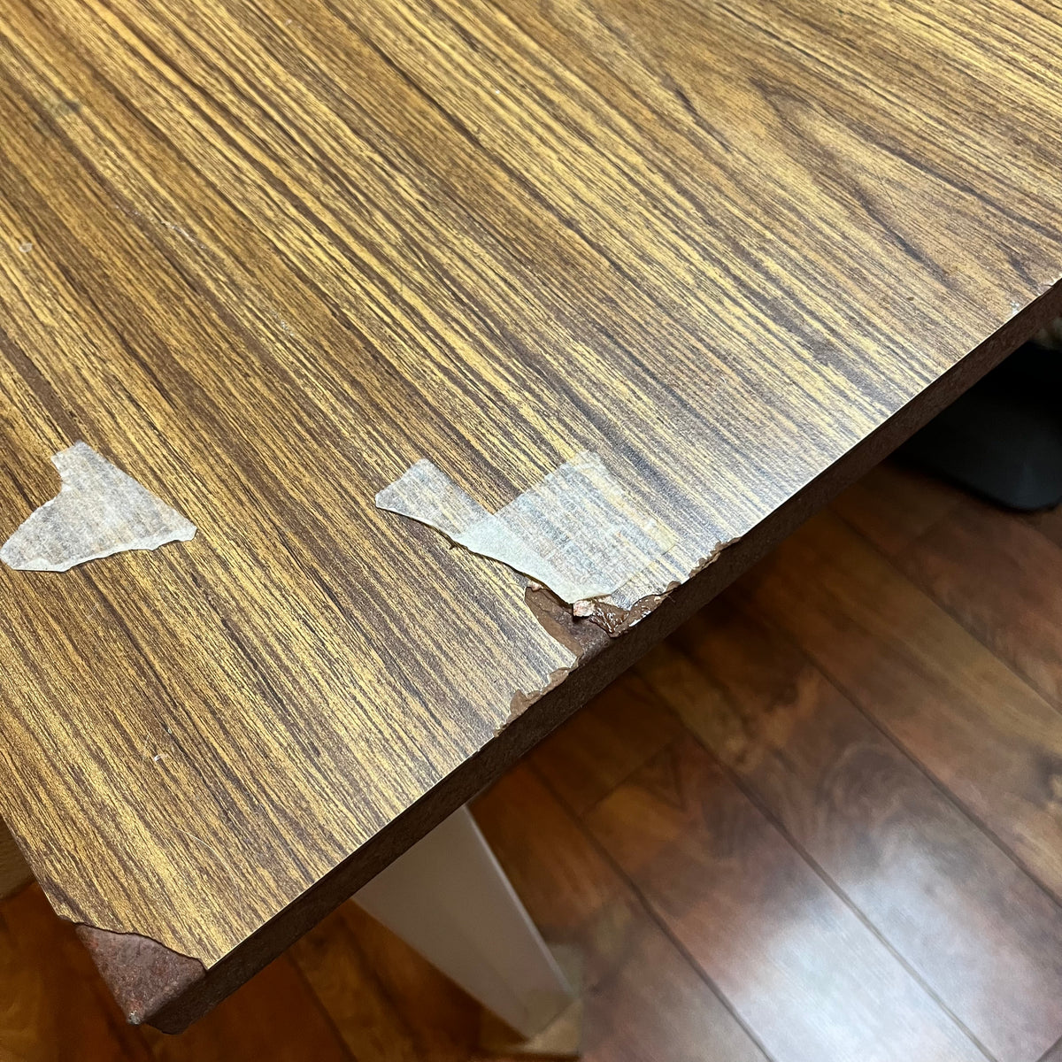 F615 Vintage metal table with wooden veneer top (6ft x 3ft x 29" high, veneer is peeling)