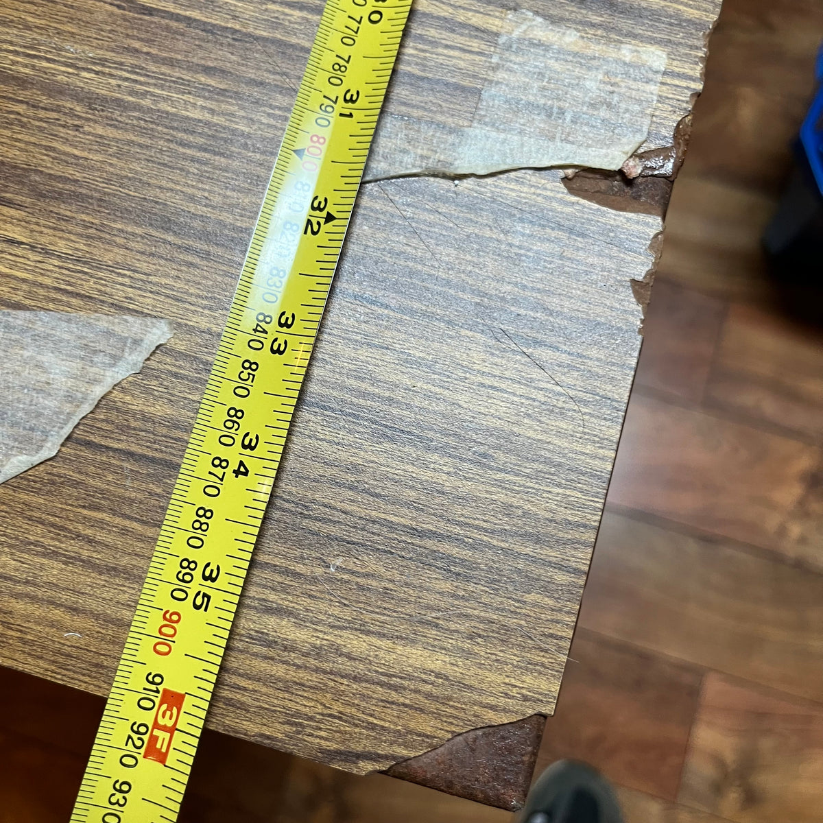 F615 Vintage metal table with wooden veneer top (6ft x 3ft x 29" high, veneer is peeling)