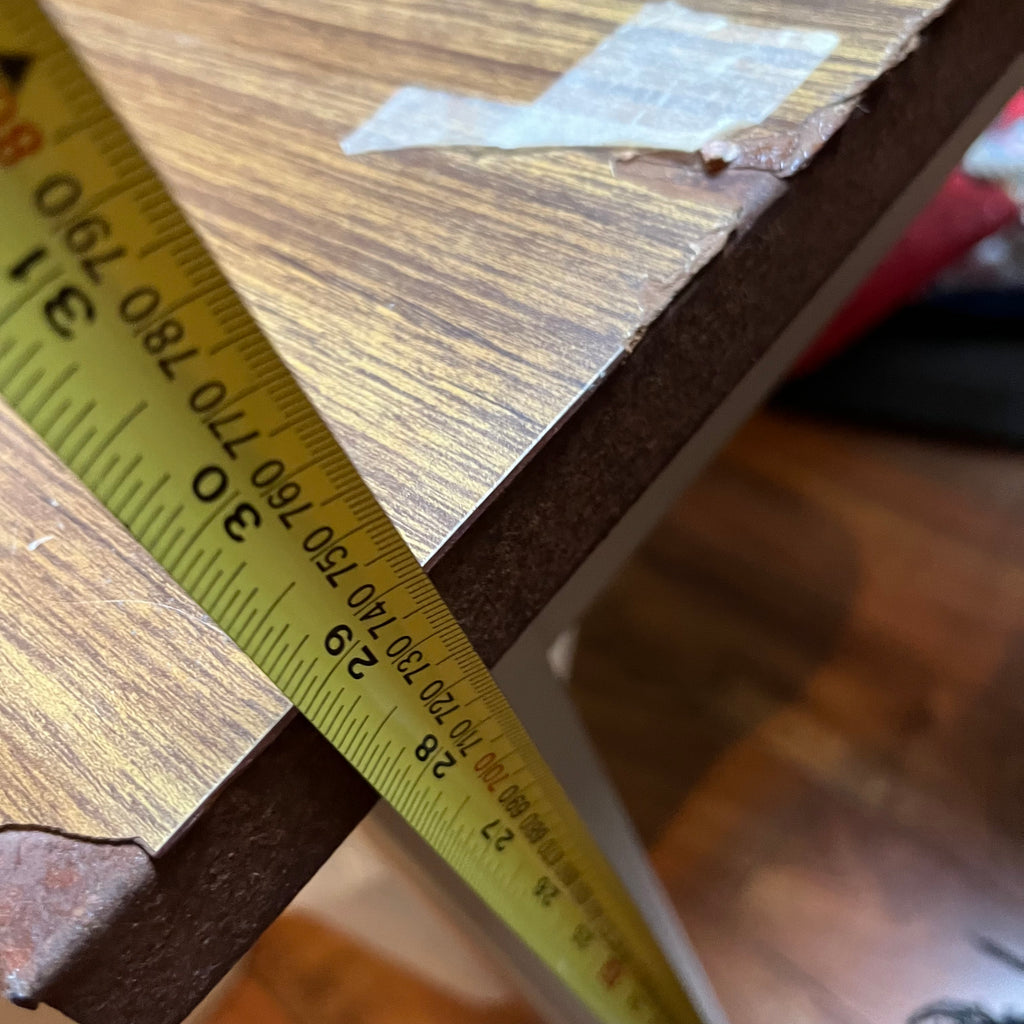 F615 Vintage metal table with wooden veneer top (6ft x 3ft x 29" high, veneer is peeling)