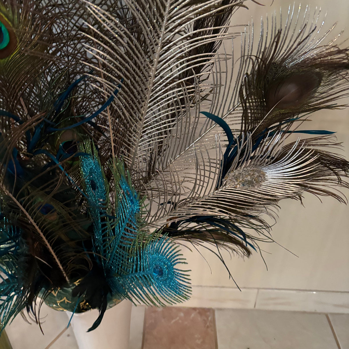 F270 Ceramic vase with peacock feathers