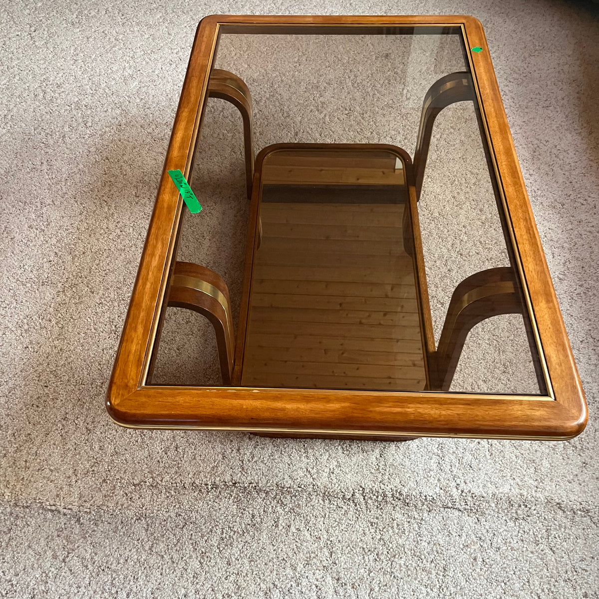 F638 Vintage glass and wood coffee table (48" x 30" x 15")