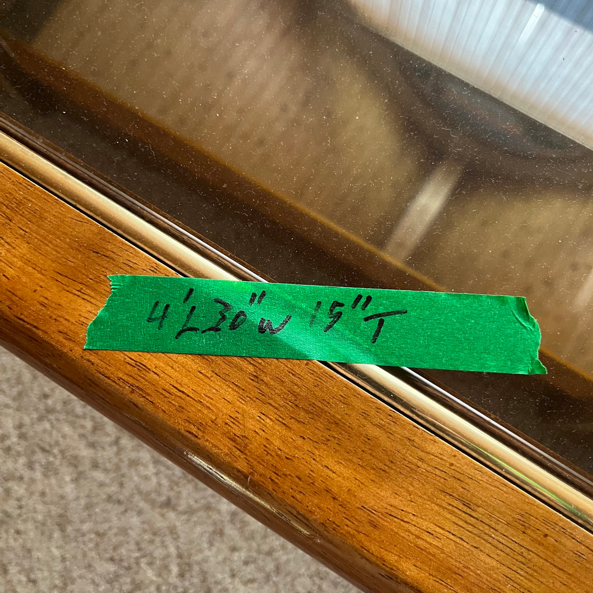 F638 Vintage glass and wood coffee table (48" x 30" x 15")