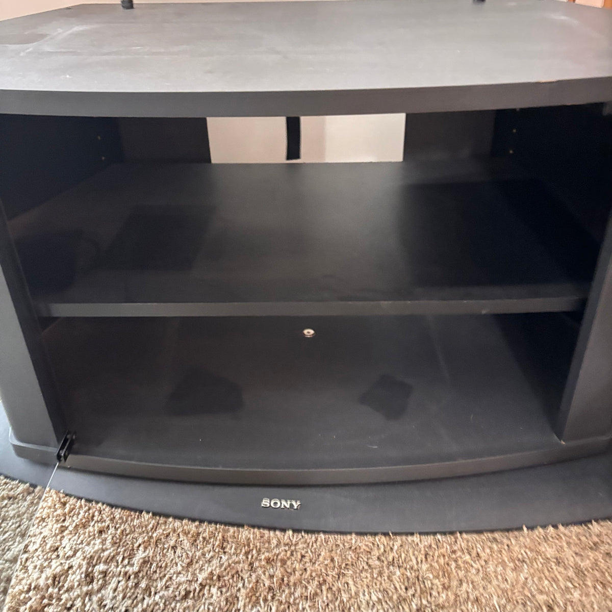 K303 Modern black entertainment stand with glass door and shelving