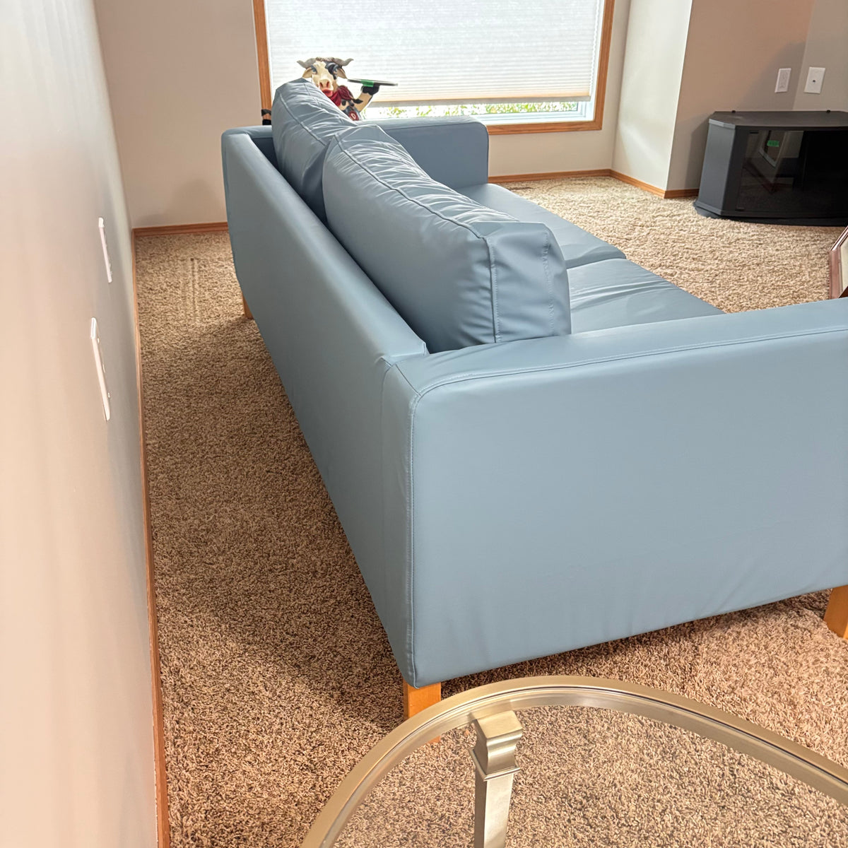K305 IKEA Parup sofa in light blue faux leather fabric