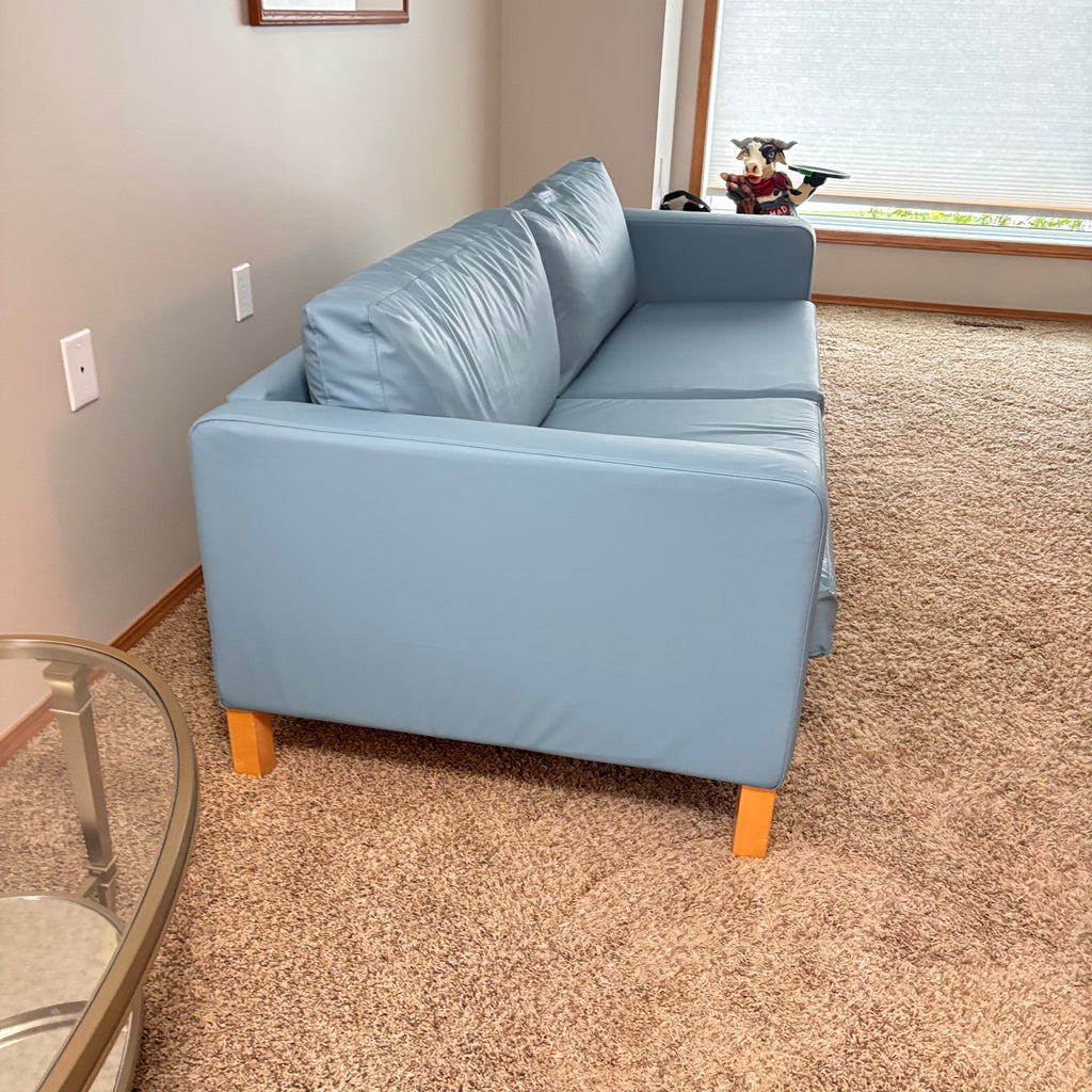K305 IKEA Parup sofa in light blue faux leather fabric