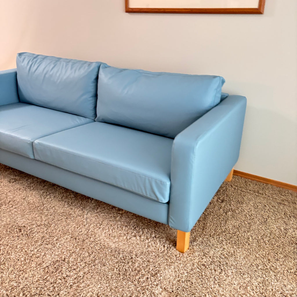 K305 IKEA Parup sofa in light blue faux leather fabric