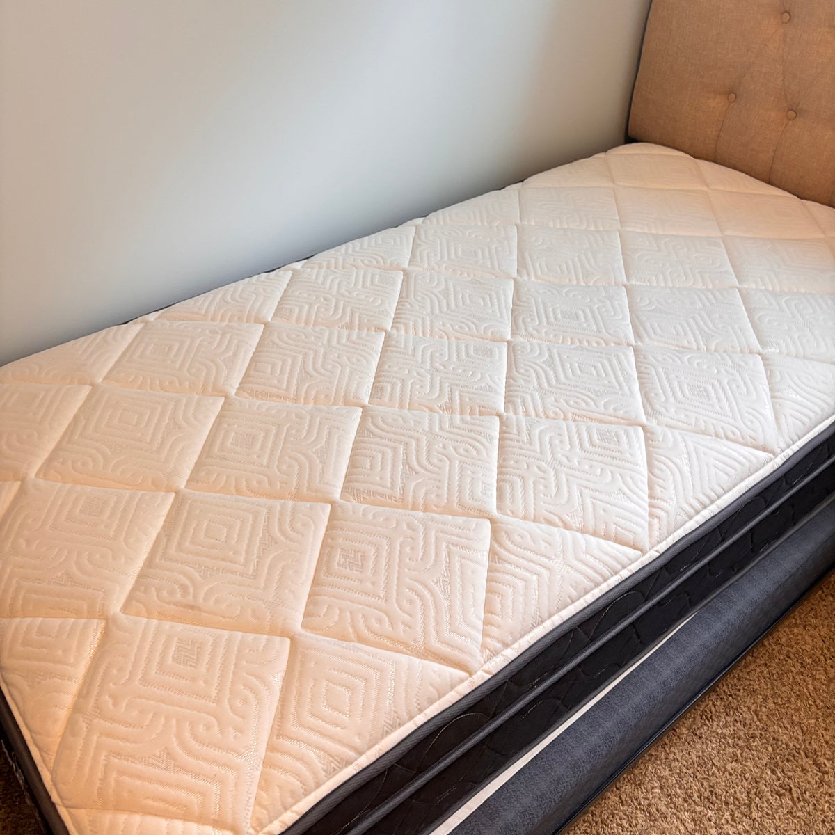 K320 Twin size bed ensemble with quilted headboard, mattress and box spring