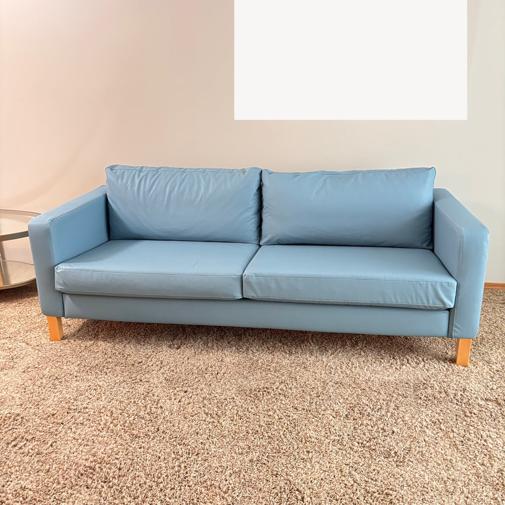 K305 IKEA Parup sofa in light blue faux leather fabric