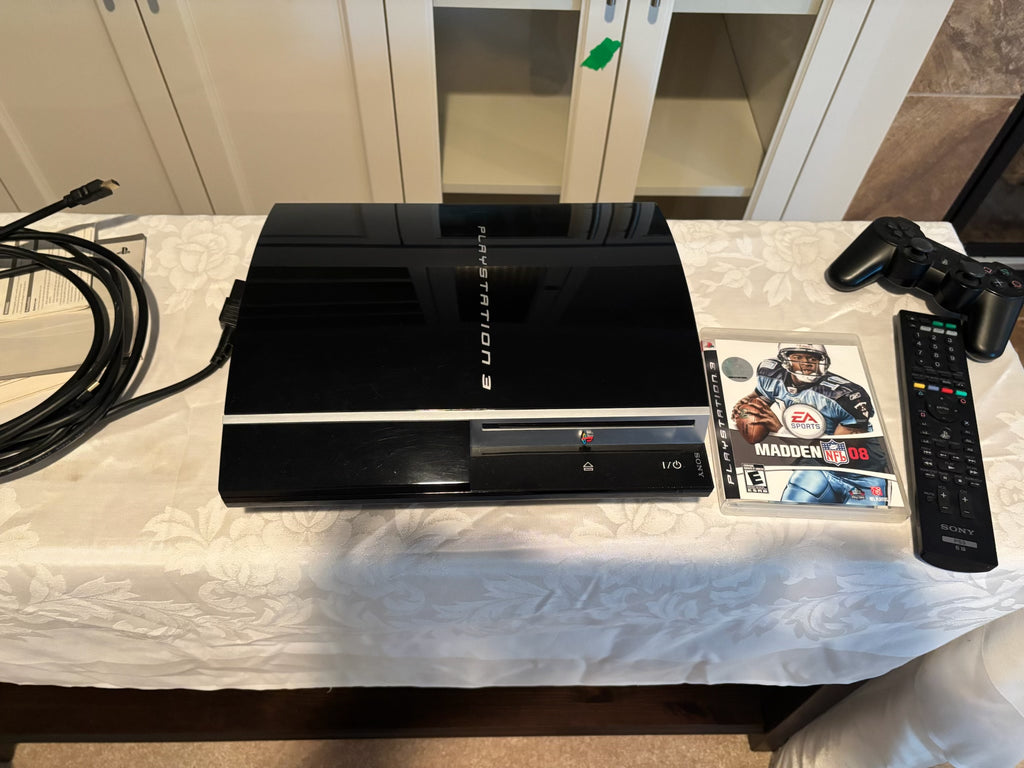 X104 Sony Playstation 3 with accessories