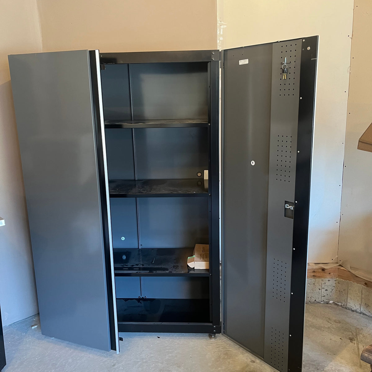 X303 Husky 2 door steel garage cabinet with shelving