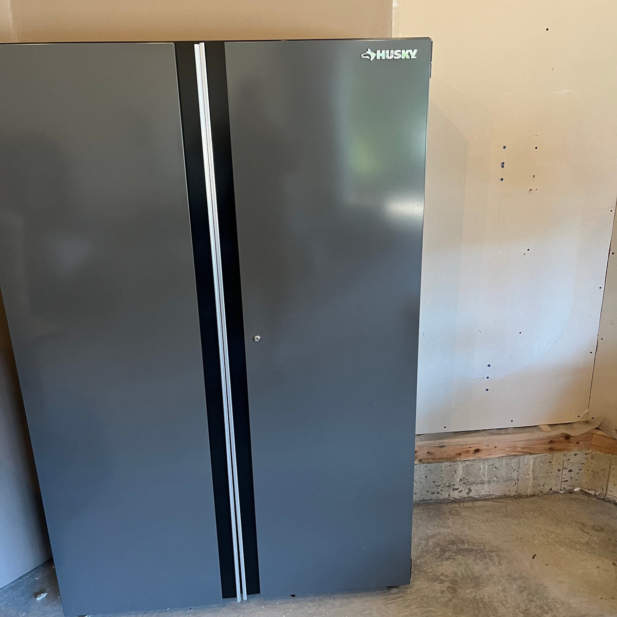 X303 Husky 2 door steel garage cabinet with shelving
