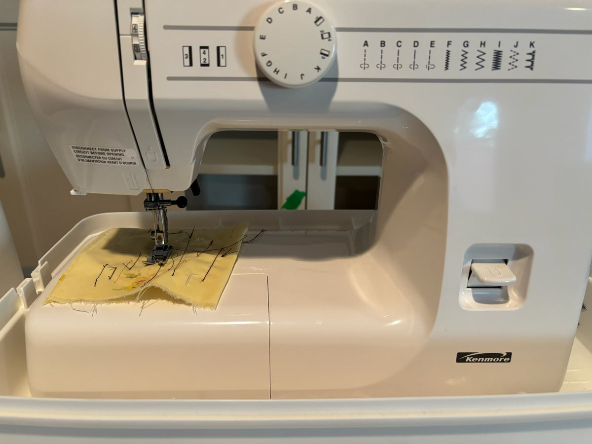 X114 Kenmore Sewing Machine with Carrying Case (table not included)