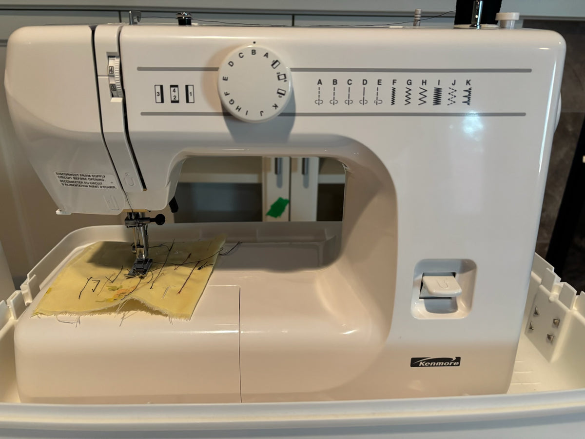 X114 Kenmore Sewing Machine with Carrying Case (table not included)