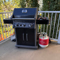 X223 Napoleon Rogue propane BBQ with propane tank