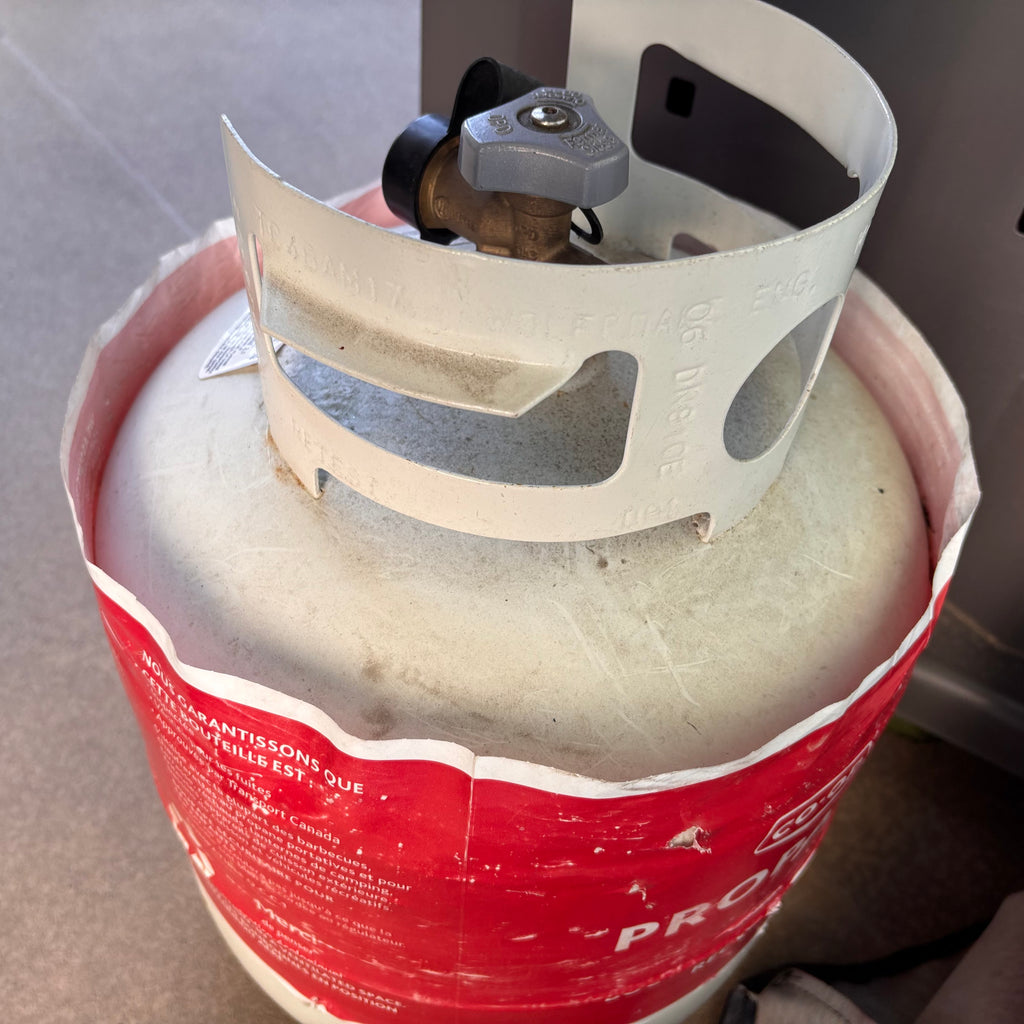X223 Napoleon Rogue propane BBQ with propane tank
