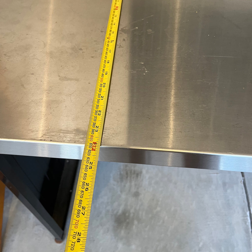 X308 Husky metal worktable (dent in back panel)