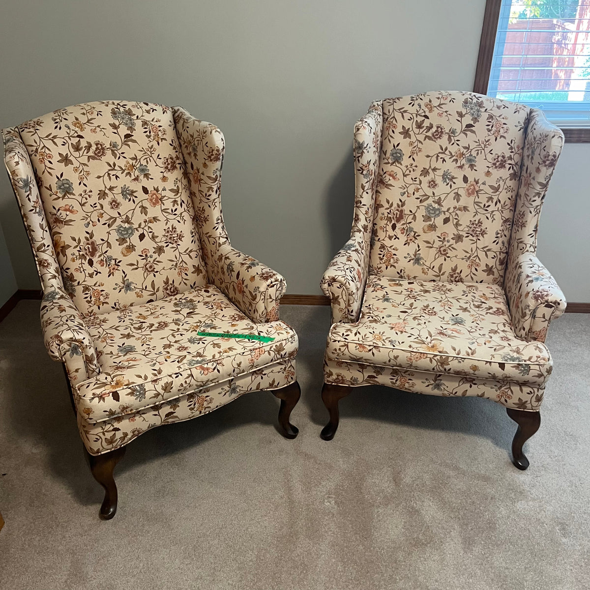 X317 Pair of vintage wingback chairs with floral upholstery