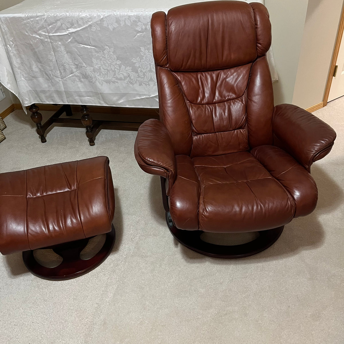 Y338A Brown leather glider/recliner with matching ottoman