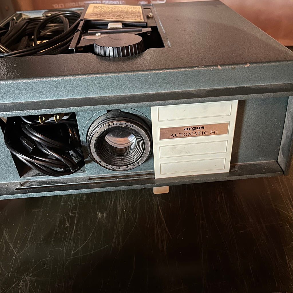 Y325 Vintage slide projector grouping, table not included)