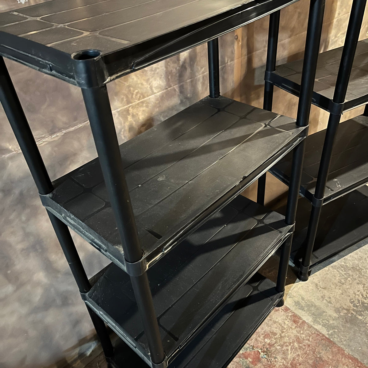 E204 set of 2 black plastic shelving units