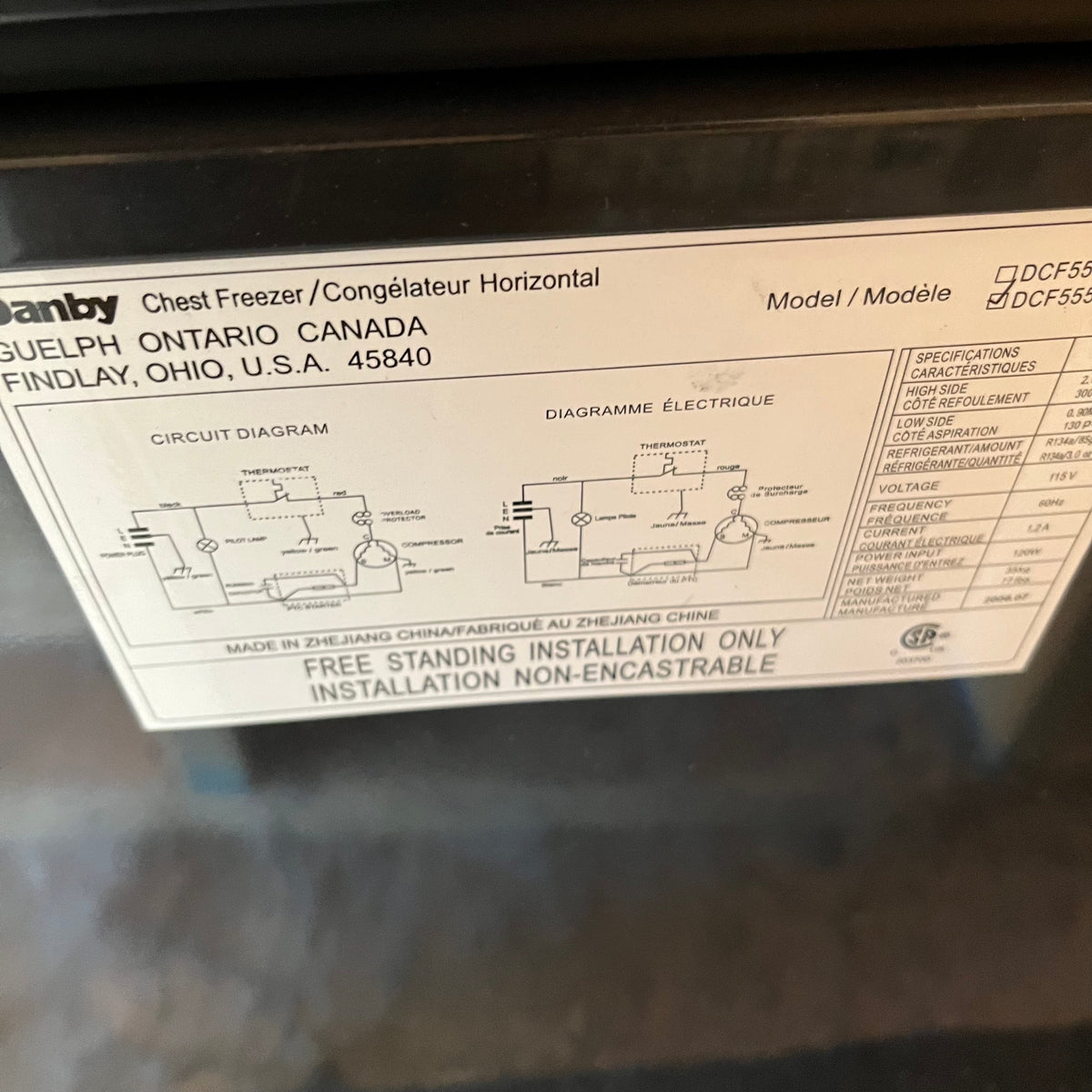 Y342 Black Danby chest freezer (model DCF5558L, 32" x 23" x 34", contents not included)