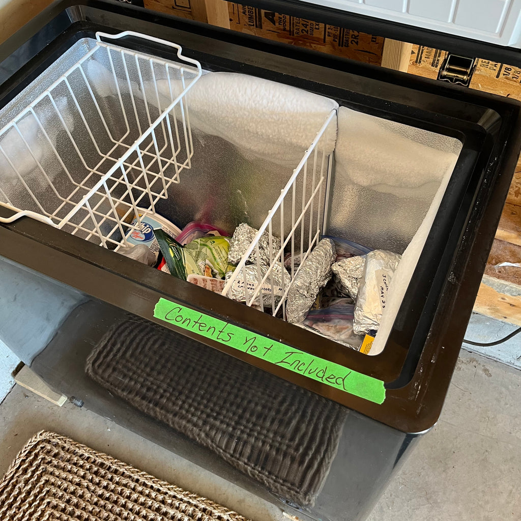Y342 Black Danby chest freezer (model DCF5558L, 32" x 23" x 34", contents not included)
