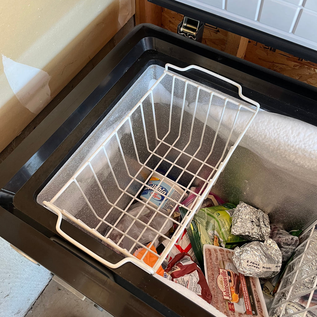 Y342 Black Danby chest freezer (model DCF5558L, 32" x 23" x 34", contents not included)