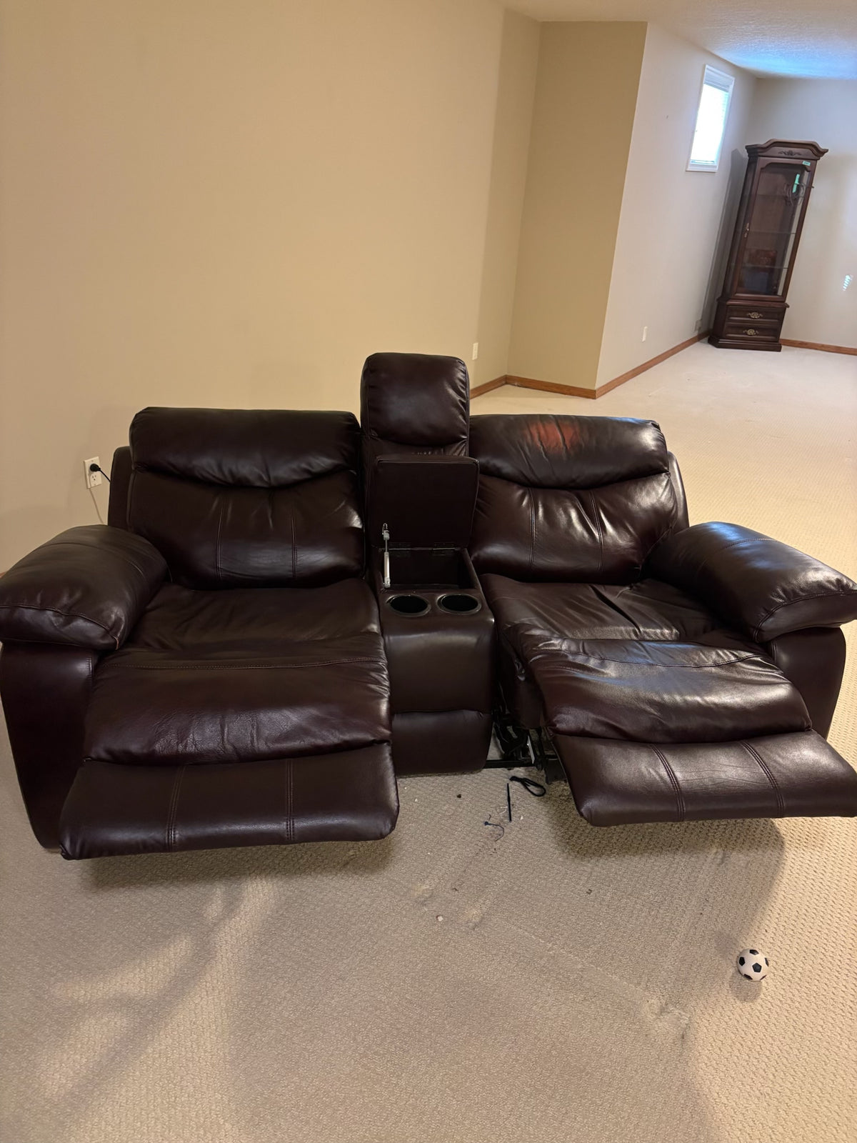 B227 Brown leather theatre reclining couch (some wear on headrest)