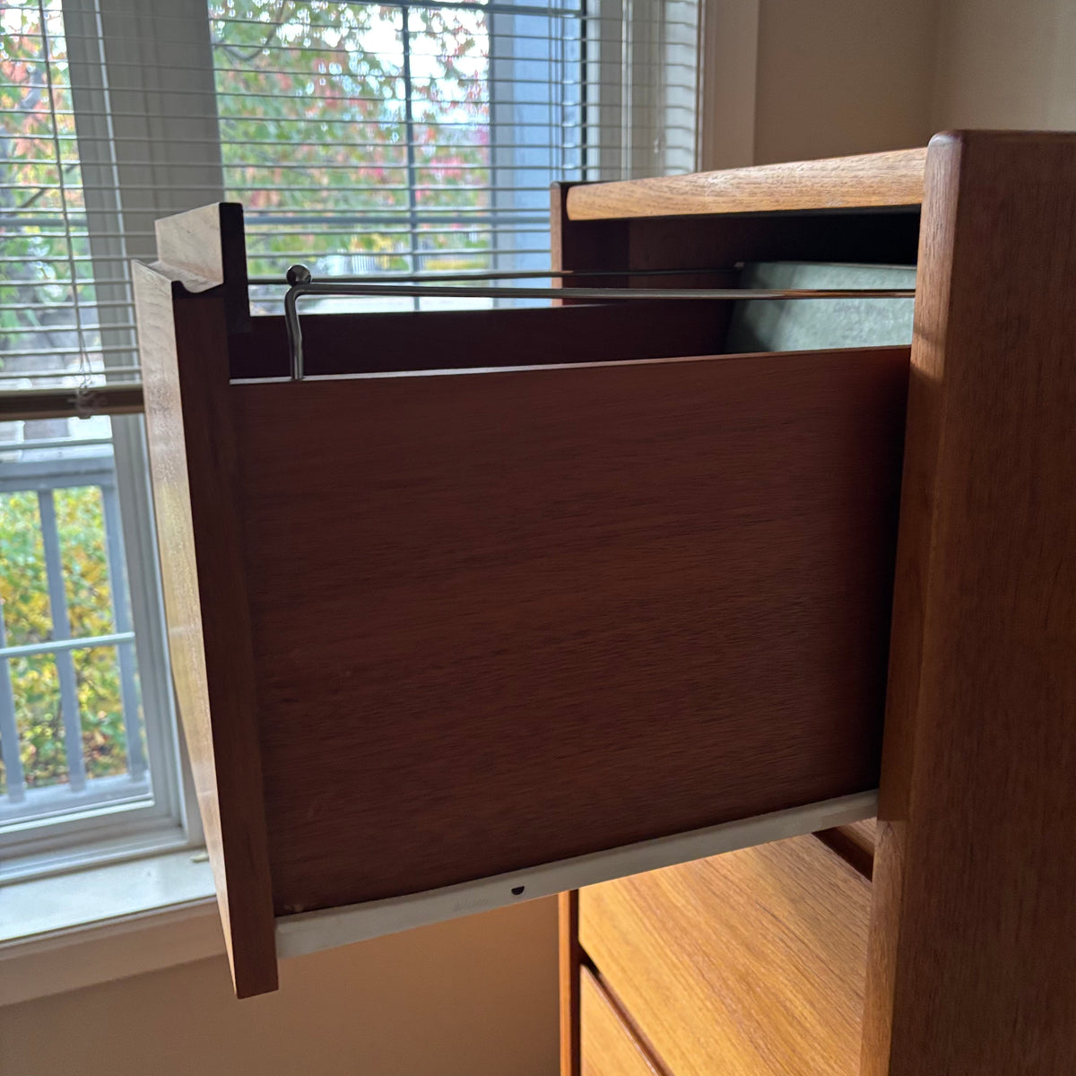 B106 Mid Century teak four drawer filing cabinet (53.5” x 24” x 17”)*** some wear on top and scratches on side