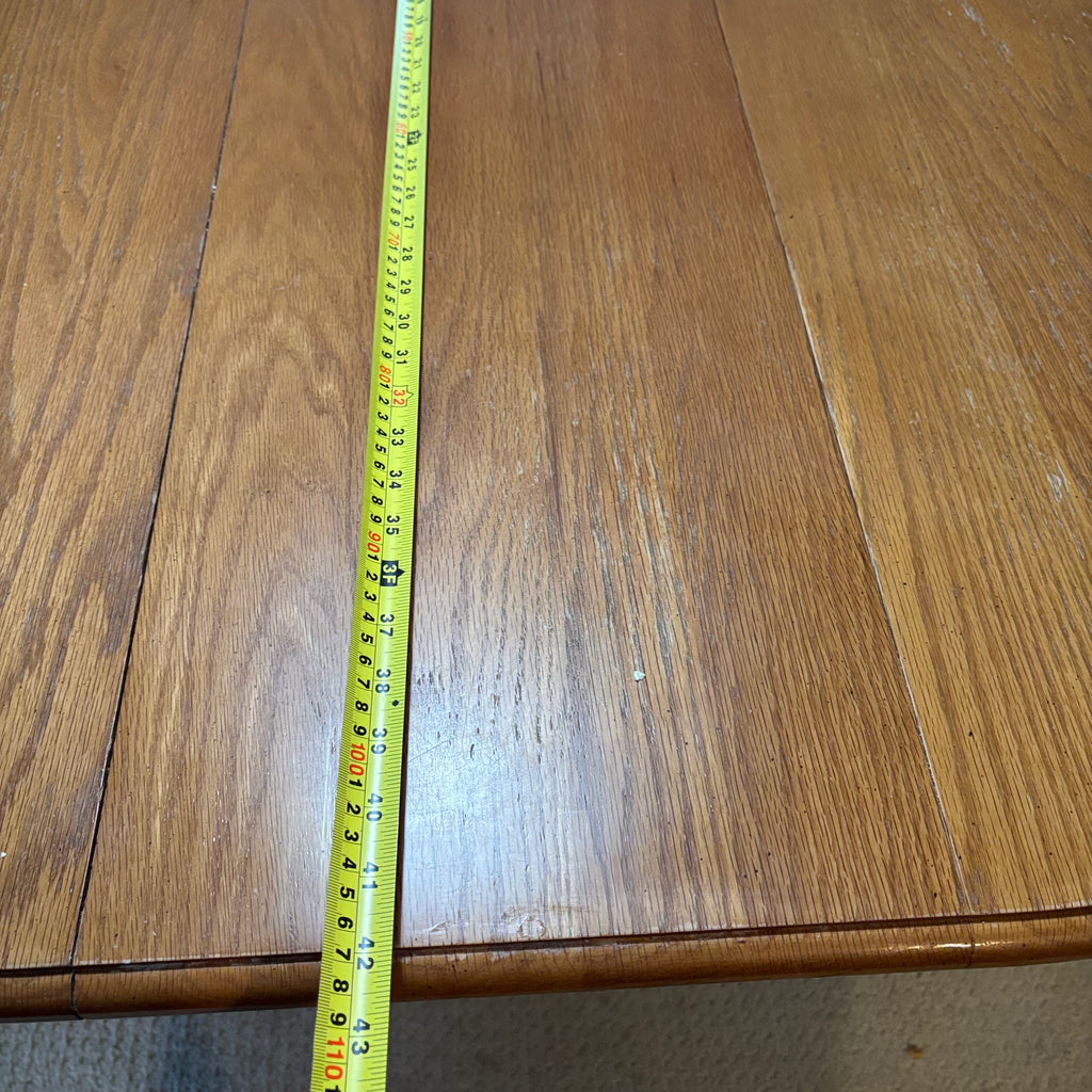B119 Vintage solid wood oval kitchen table (53" x 42" x 30") ***some wear on top, pictured with leaf