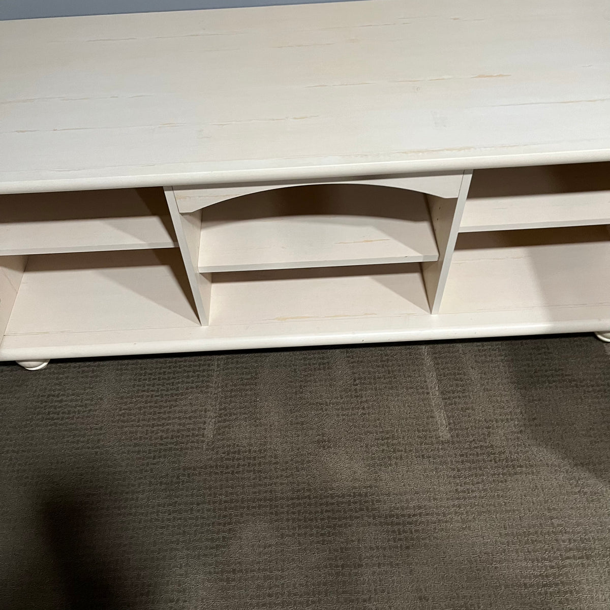 D306 Light colored wooden entertainment centre with storage (wear on top, 60" x 23" x 24")
