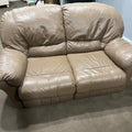 D319 Light beige leather reclining loveseat (wear on leather)