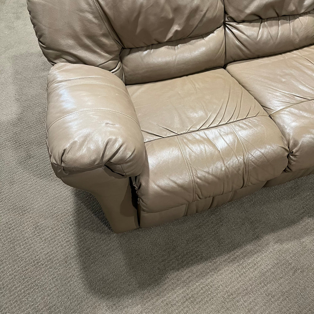 D319 Light beige leather reclining loveseat (wear on leather)