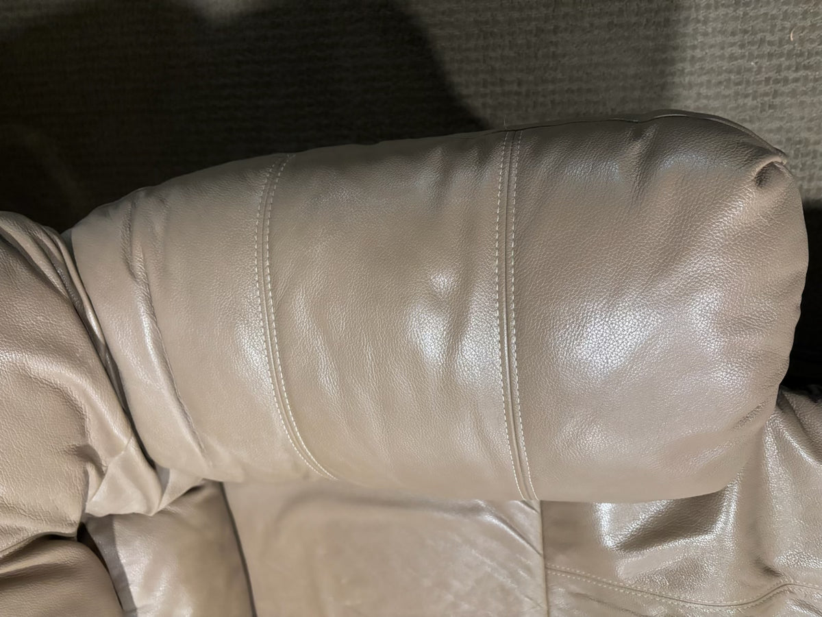 D217 Light beige leather reclining loveseat (wear on leather)