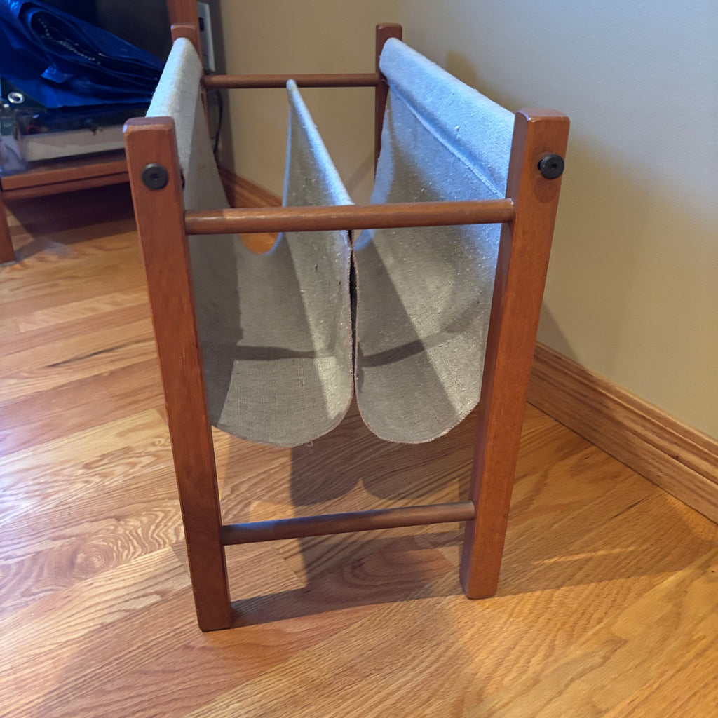 R110 VINTAGE TEAK FRAMED MAGAZINE STAND AND FOLDING CHAIR