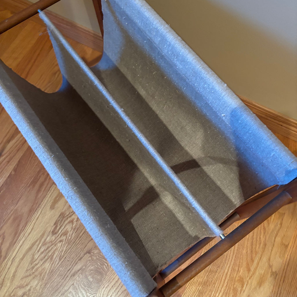 R110 VINTAGE TEAK FRAMED MAGAZINE STAND AND FOLDING CHAIR