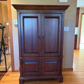 R124 Dark wood entertainment armoire with slide in doors  ***contents not included