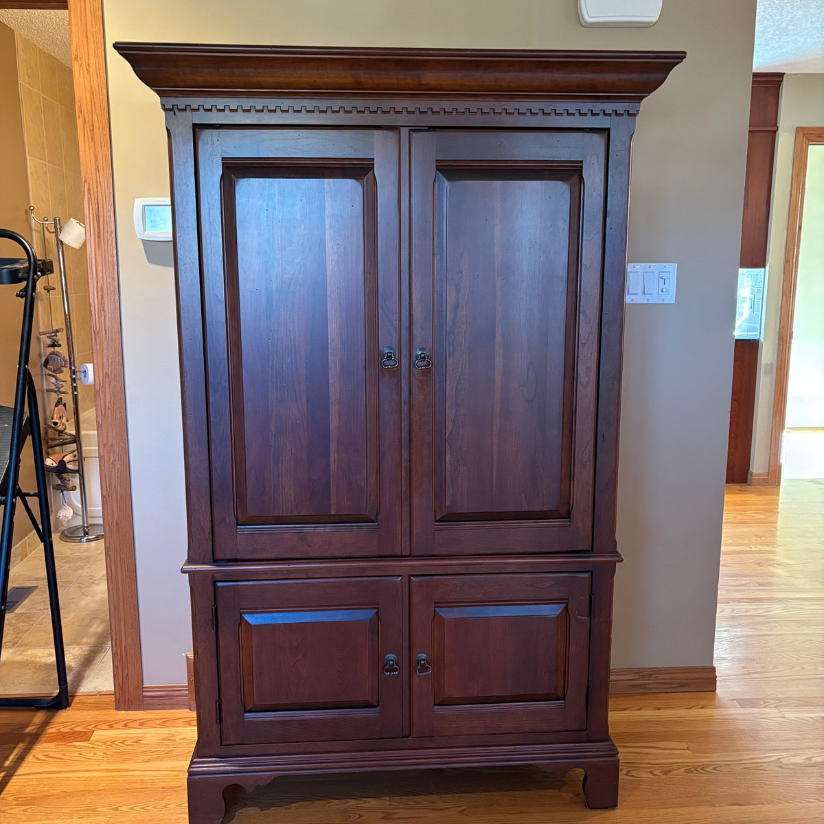 R124 Dark wood entertainment armoire with slide in doors  ***contents not included