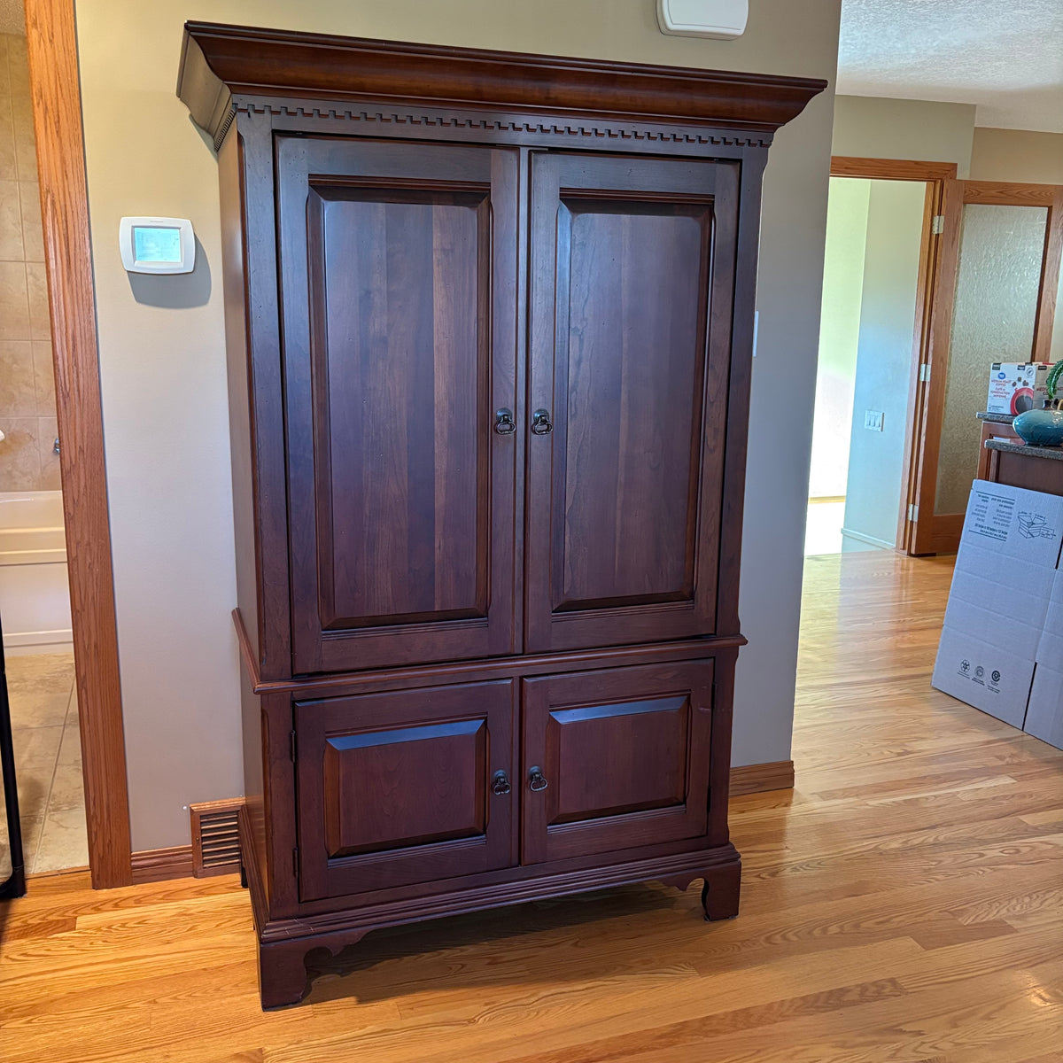R124 Dark wood entertainment armoire with slide in doors  ***contents not included