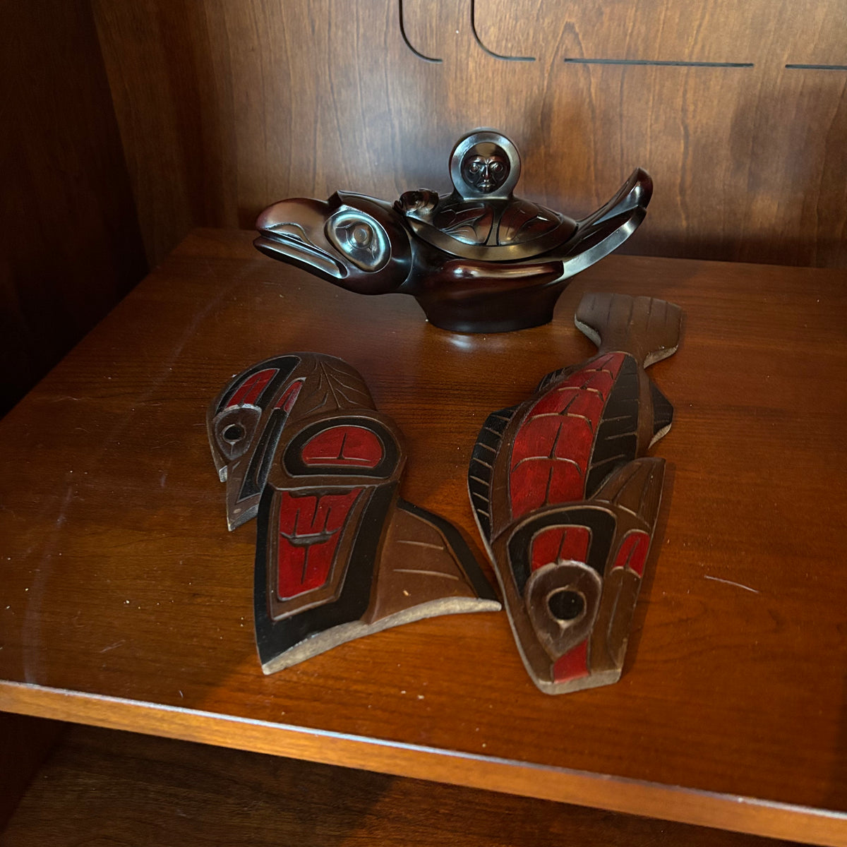 R137 Northwest Coast Style Grouping (wooden wall plaques and Boma spirit box )