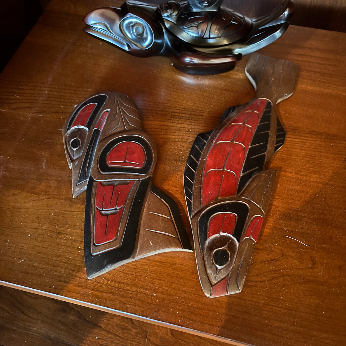 R137 Northwest Coast Style Grouping (wooden wall plaques and Boma spirit box )