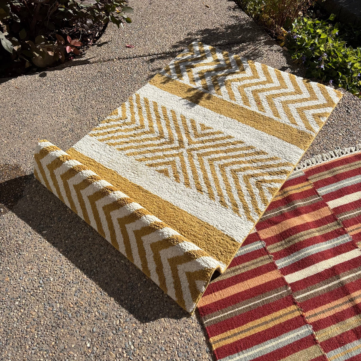 R156 2 Brightly colored striped throw rugs
