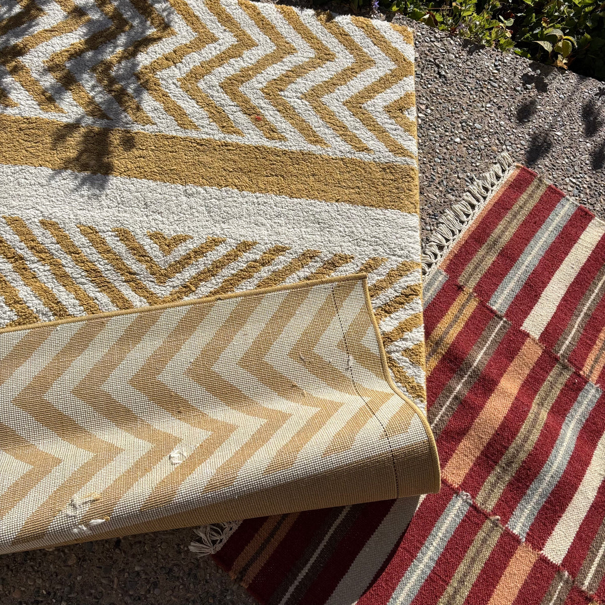 R156 2 Brightly colored striped throw rugs