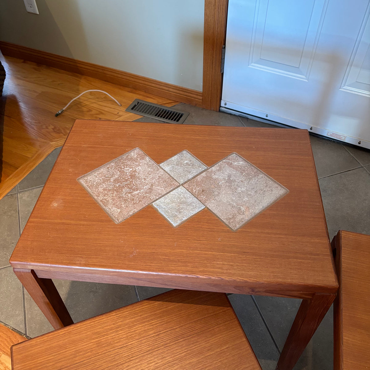 R160 Set of 3 Mid century teak nesting tables (one table has inlaid design)