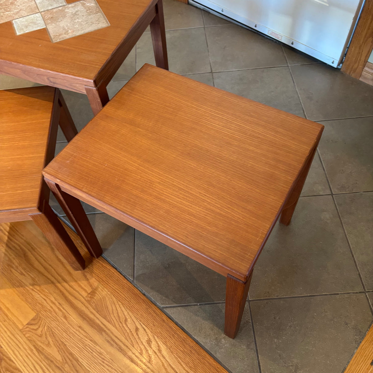 R160 Set of 3 Mid century teak nesting tables (one table has inlaid design)