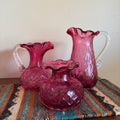R164 3 Piece Vintage Cranberry Glass Grouping (jugs and more)